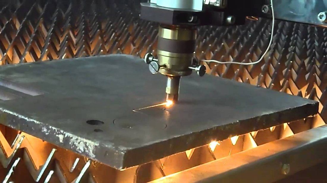 Aluminium plate being cut on the shop floor