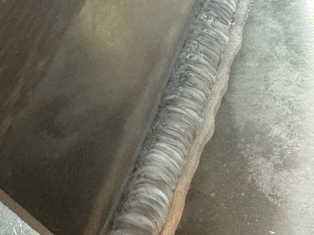 A welded seam in aluminium plate — and the heat it leaves behind